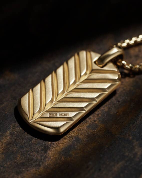 An image of a Chevron yellow gold tag.
