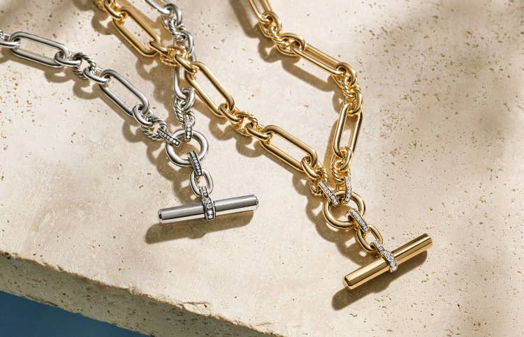 Two David Yurman Lexington necklaces in yellow gold and sterling silver.
