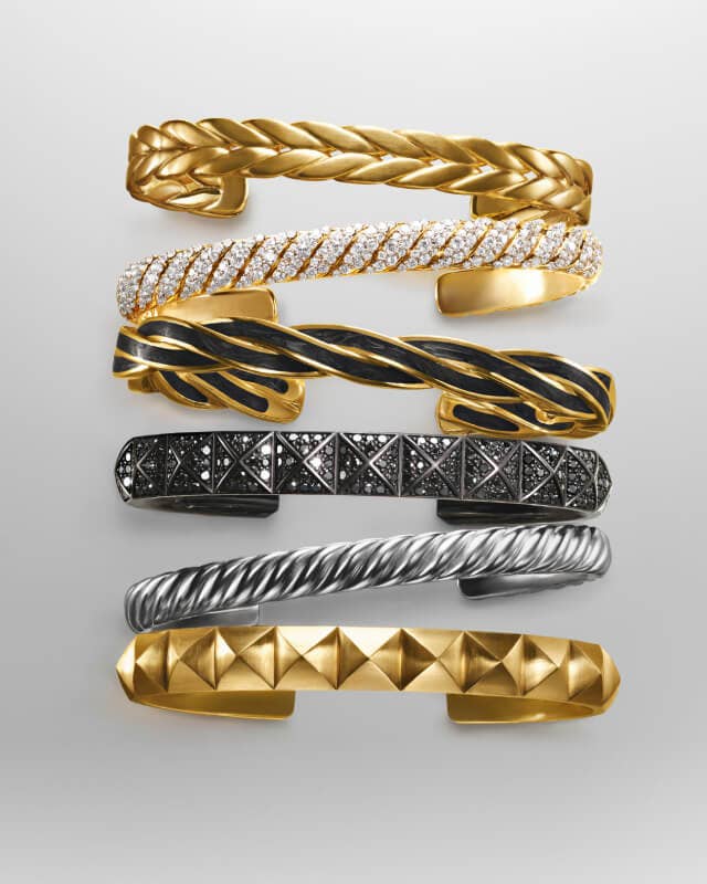 Six David Yurman bracelets for men.