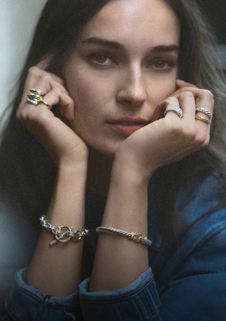 A female model wearing David Yurman Crossover jewelry.