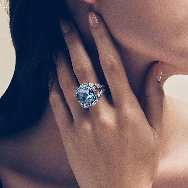 A woman wearing a David Yurman ring.