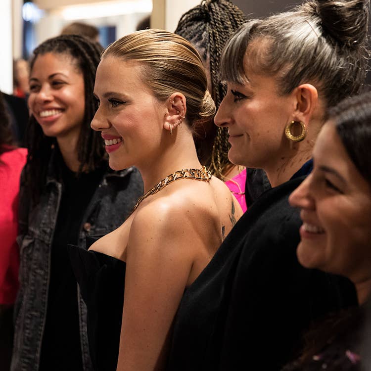 An image of Scarlett Johansson with event goers.