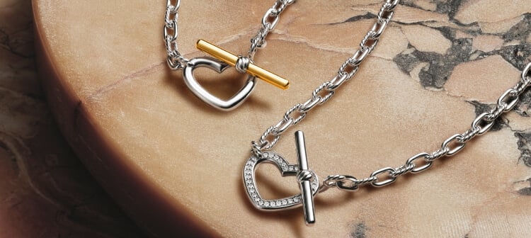 Two David Yurman heart necklaces.