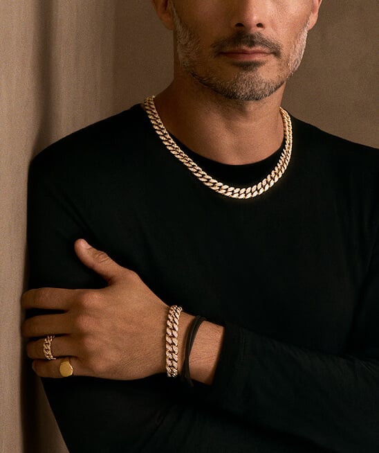 Model wearing Curb Chain jewelry.