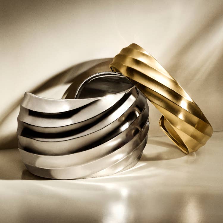 Shop these two Cable Edge cuff bracelets in yellow gold and silver.