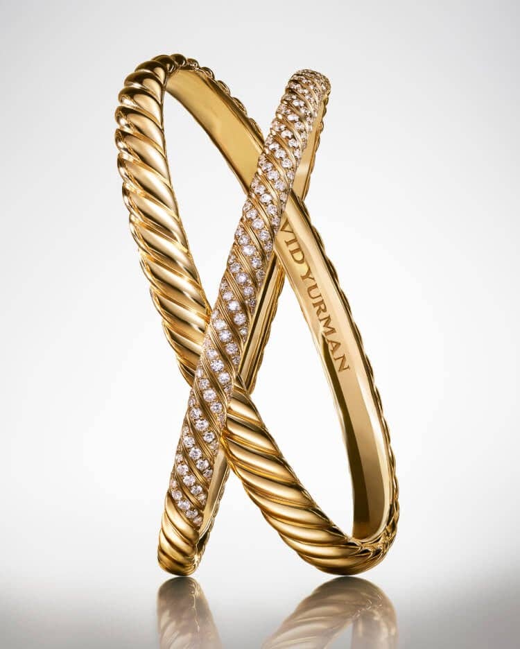 Two David Yurman Sculpted Cable bracelets for women.