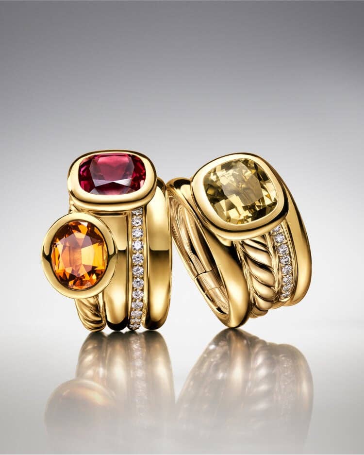 Two David Yurman Mercer gold and stone cocktail rings.