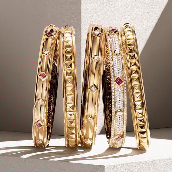 Five David Yurman bracelets.