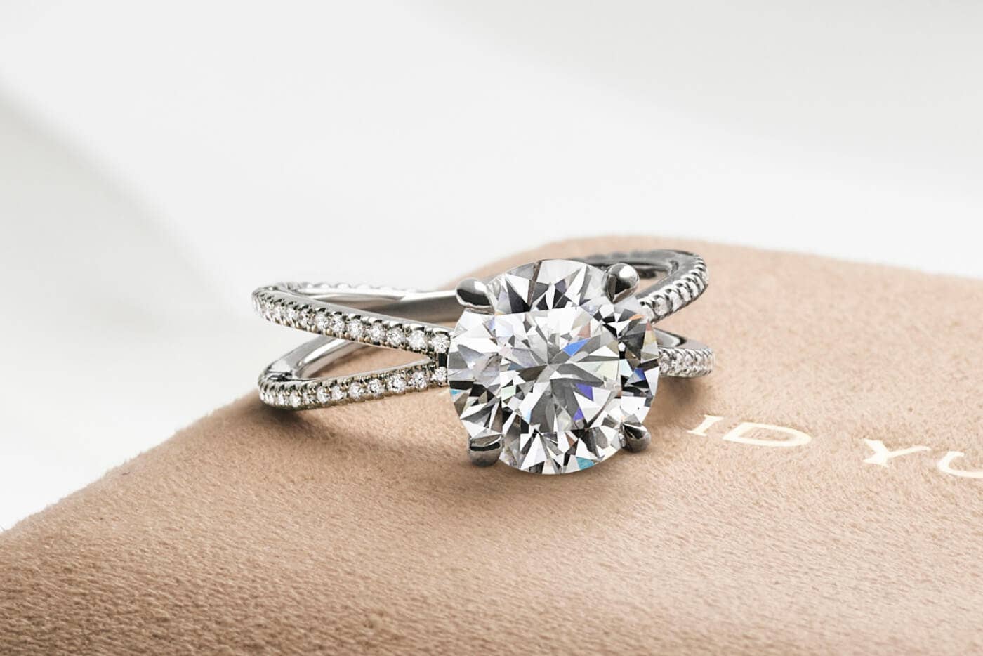 An image of engagement ring and wedding band.