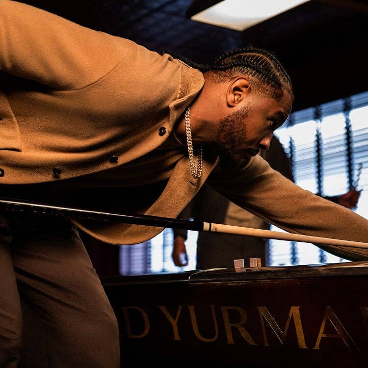 Carmelo Anthony playing pool.