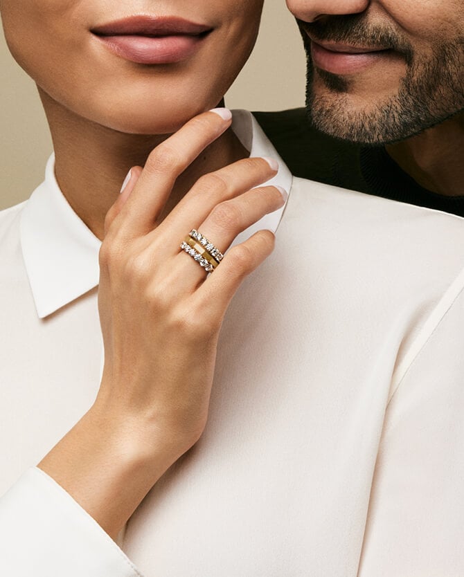 A woman wearing David Yurman rings.