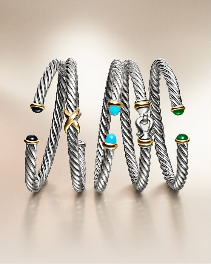 Five David Yurman cable bracelets.