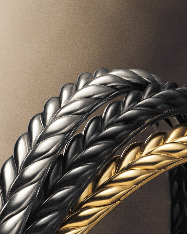 Three David Yurman chevron bracelets.