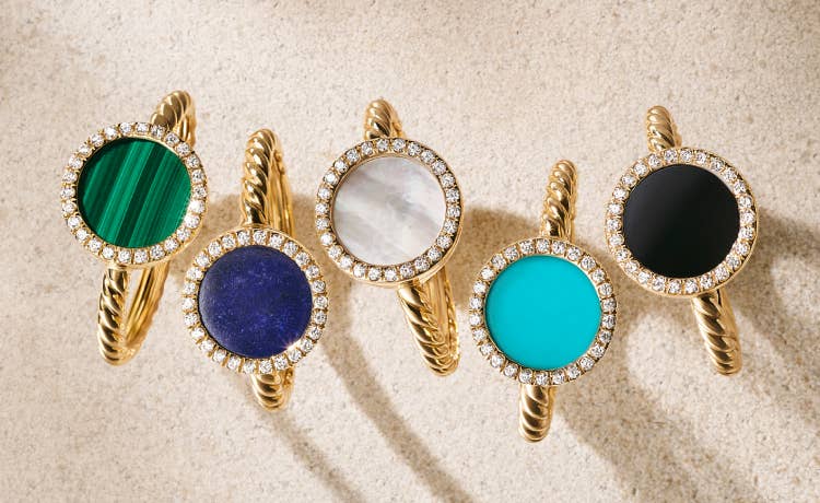 An image of 5 David Yurman petite elements rings.