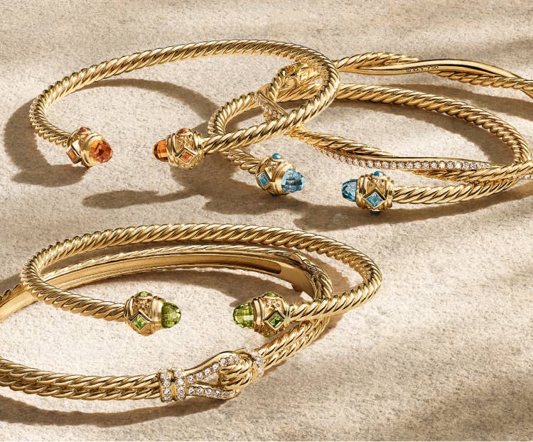 An image of cable bracelets in yellow gold.
