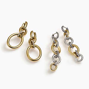 Two pairs of David Yurman drop earrings in gold and silver.