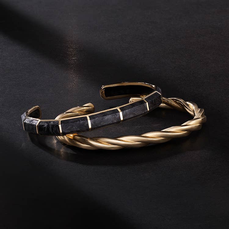 Shop these black and gold bracelets.
