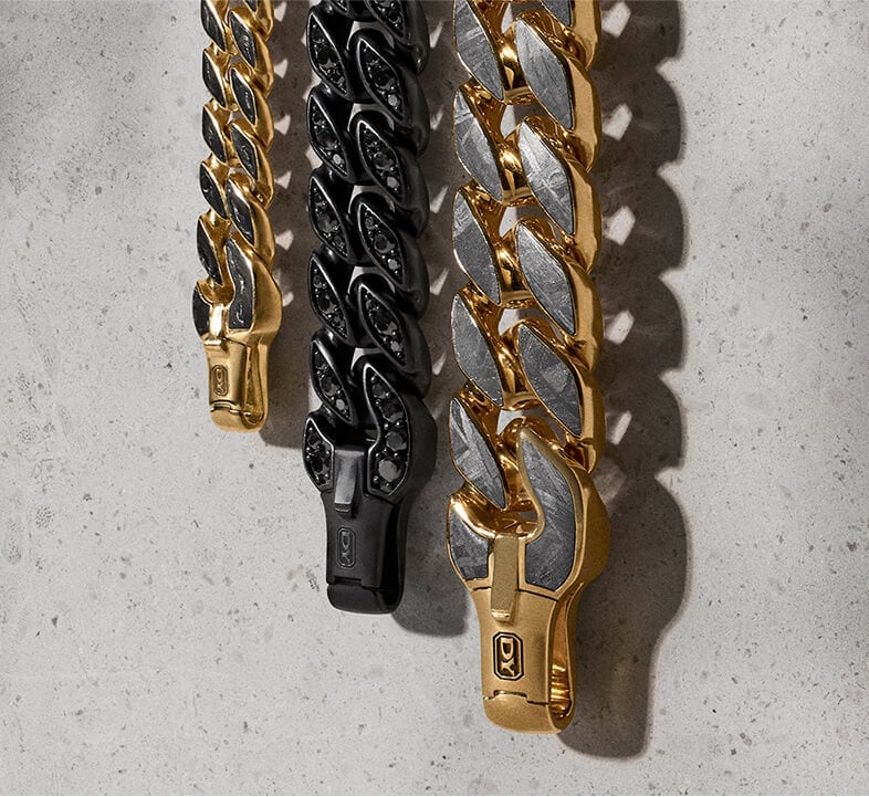 Three David Yurman chains in alternative materials for men.