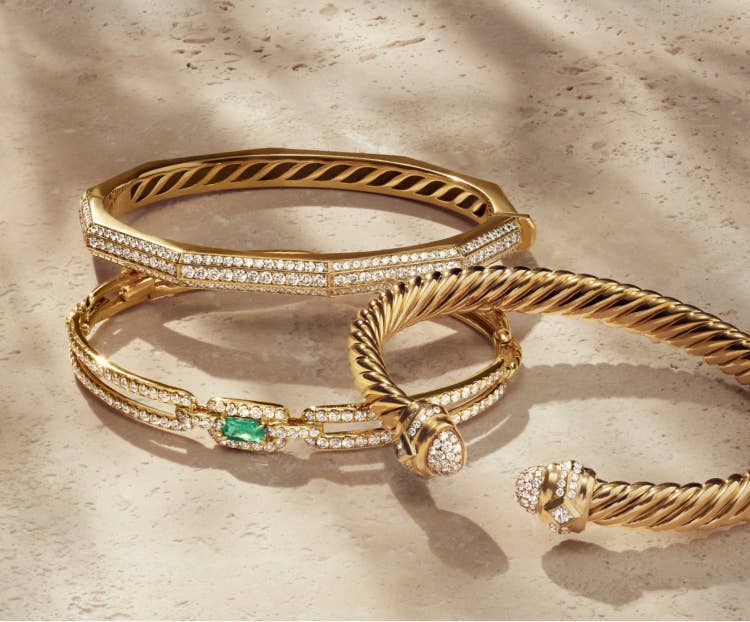 An image of three 18K Yellow Gold bracelets.