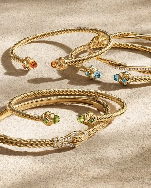 A collection of 6 David Yurman Cable Bracelets.