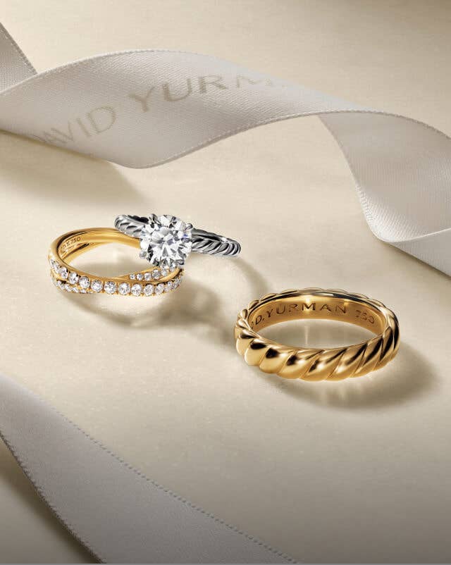 Three David Yurman rings.
