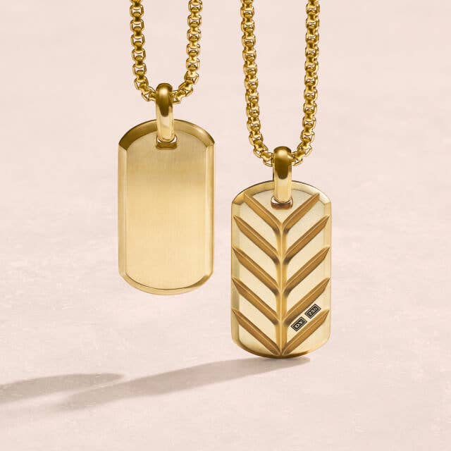 Two Yellow Gold David Yurman tags on yellow gold chains.