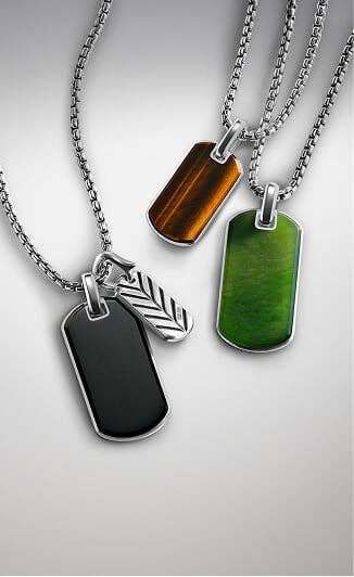 Four David Yurman tags for men.