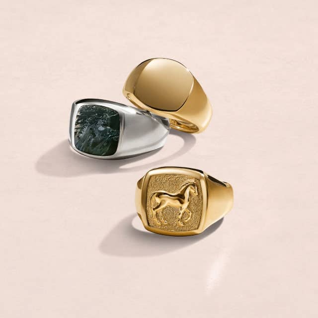 Three David Yurman pink rings.