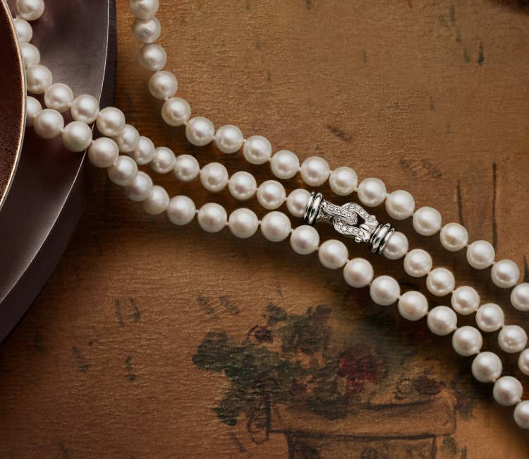 An image of a pearl strand necklace.