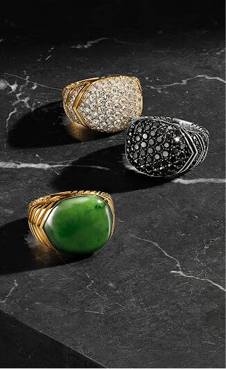 Three David Yurman rings for men.