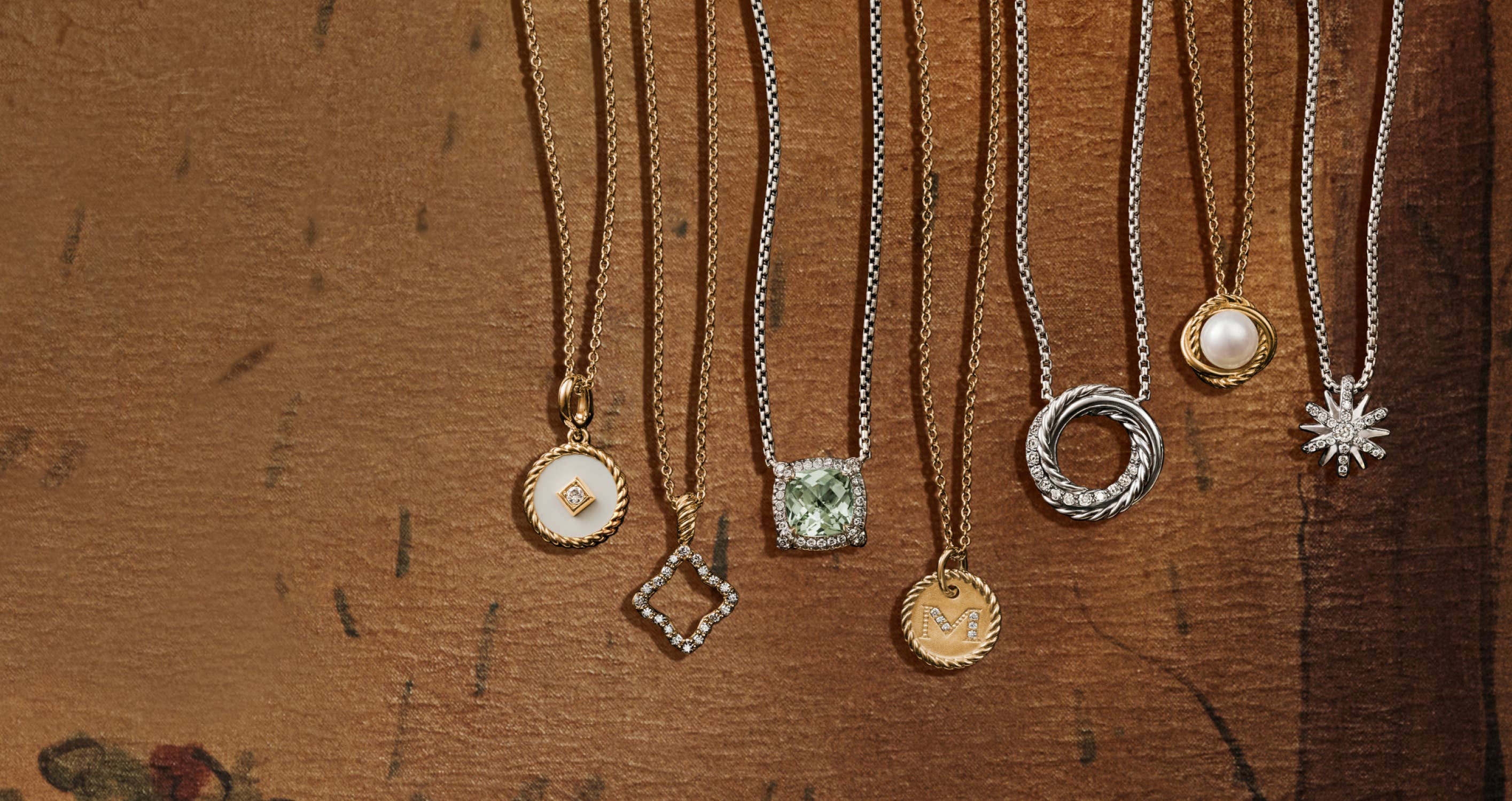 Gift Guide for her - Gifts under $1,000 featuring necklace, amulets and stones.