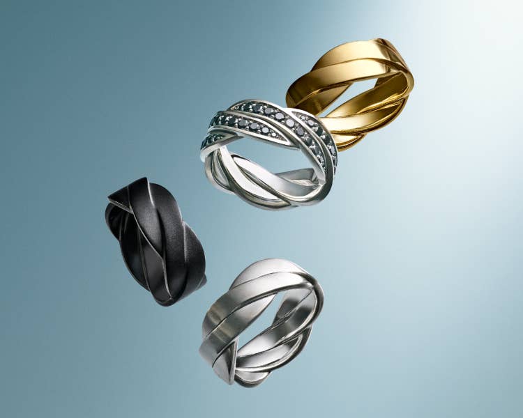 An image of Four Helios band rings.