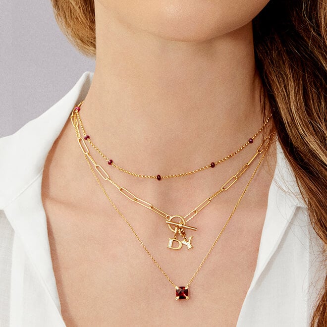 Model wearing David Yurman necklaces.