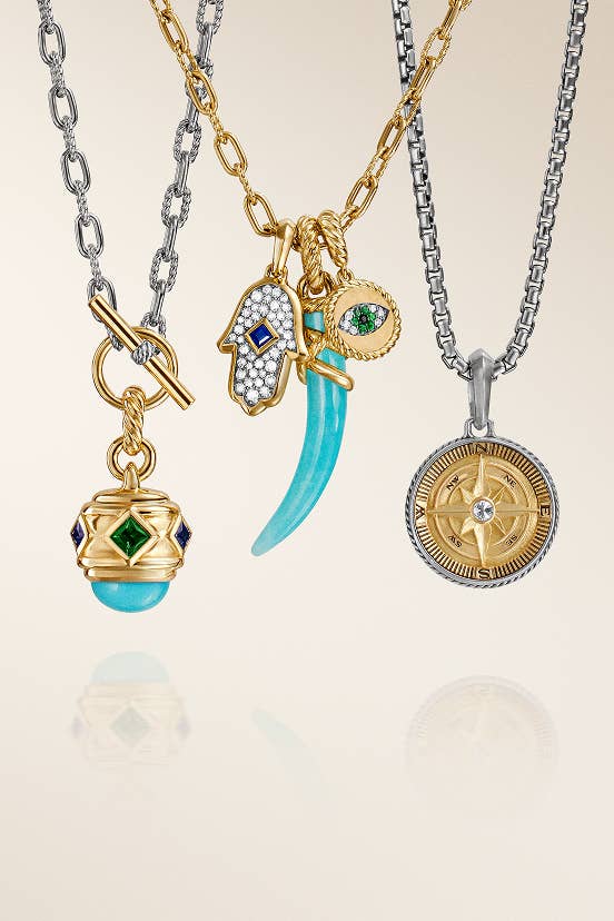A selection of men's and women's amulets on David Yurman chains.. 