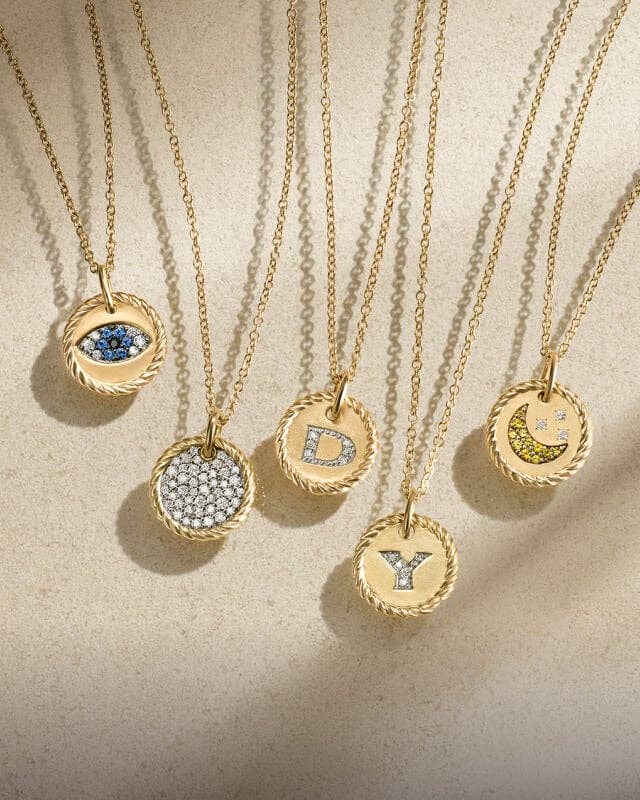 David Yurman charms and amulets in gold.