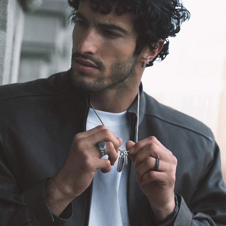 Model wearing David Yurman jewelry.