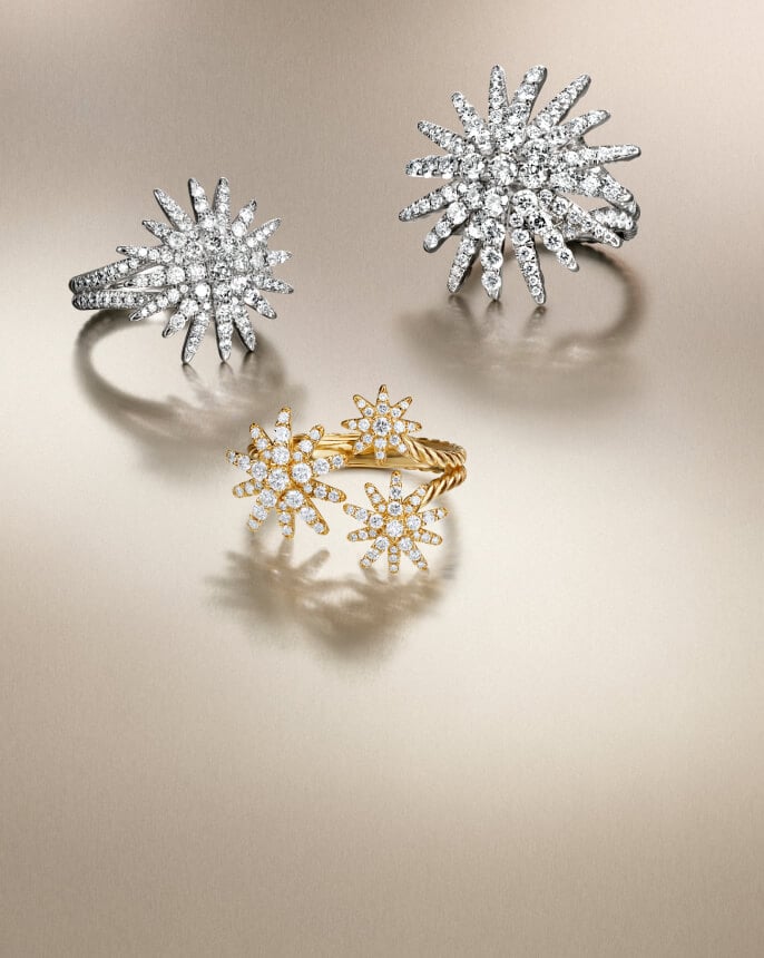 Three David Yurman Starburst rings for women.