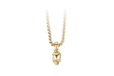 Shop skull amulet in 18K yellow gold with pave diamonds.
