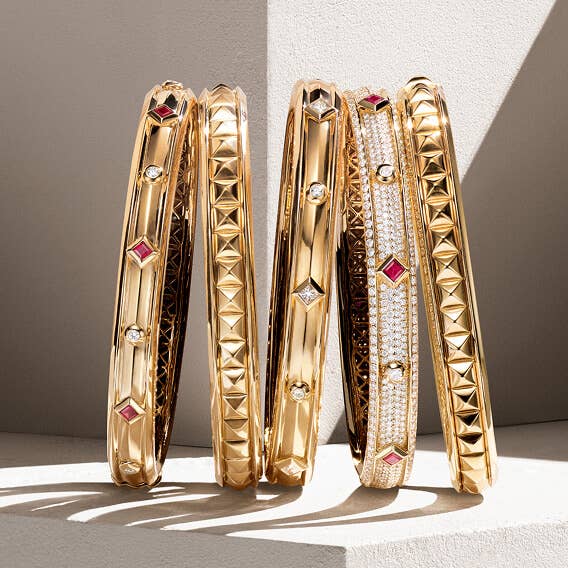 Five David Yurman bracelets.