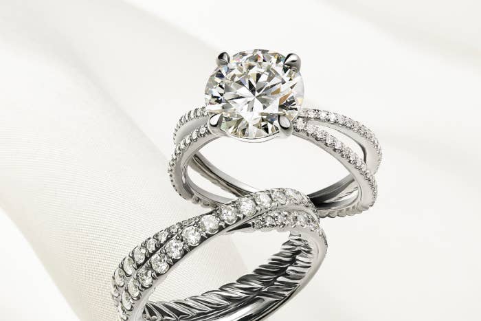 An image of engagement ring and wedding band.