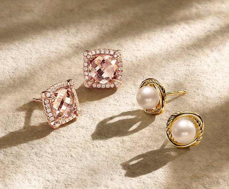 An image of two sets of gold earrings.