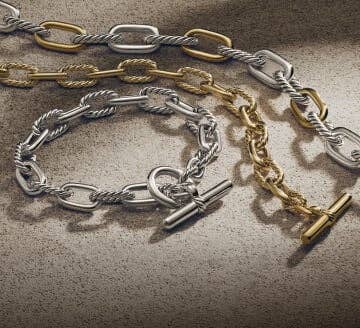 Three David Yurman DY Madison bracelets.