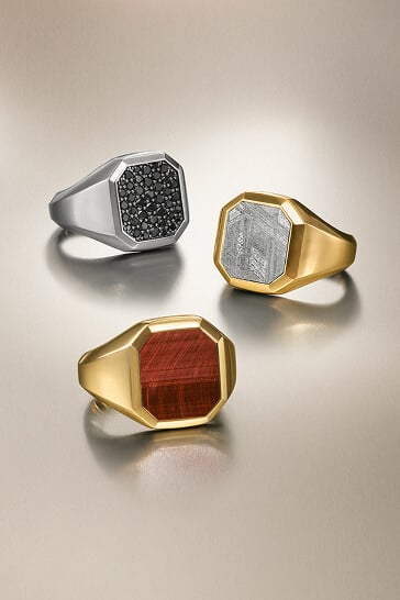 Three David Yurman men's signet rings.
