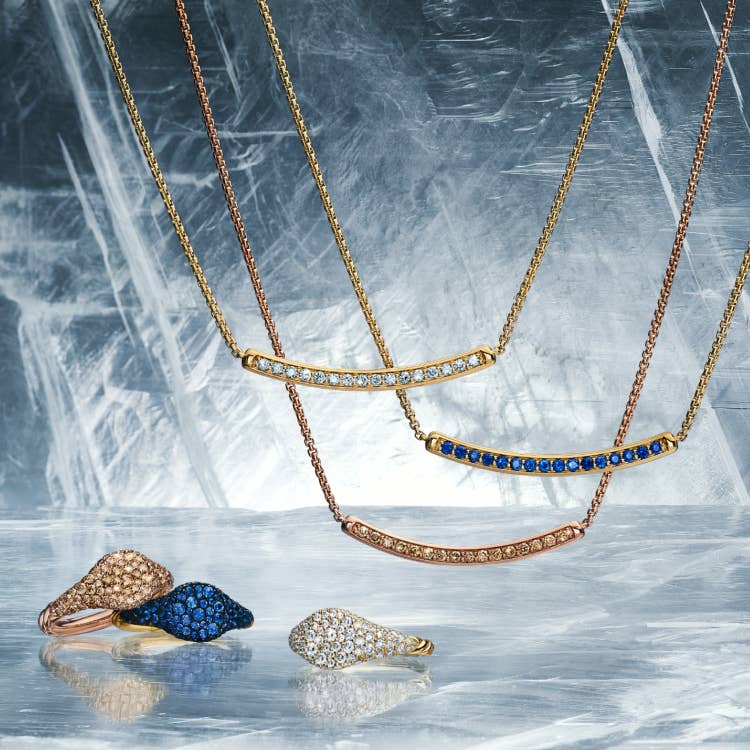 An image of David Yurman Petite Pavé necklaces and rings.