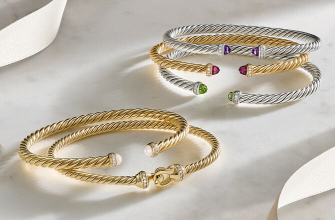 Five David Yurman Cable bracelets.