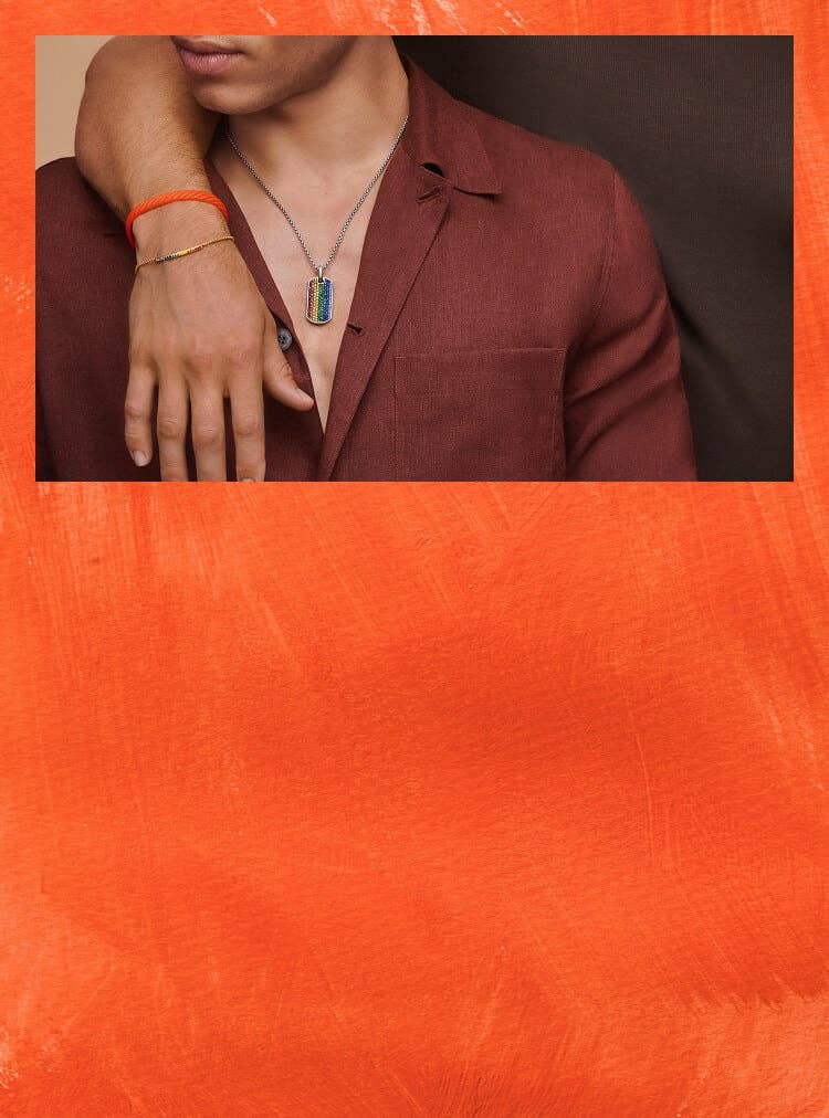 Two men wearing David Yurman Pride specific jewelry.