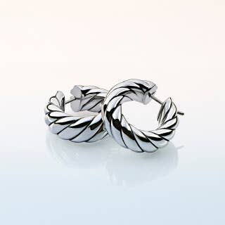 One pair of silver David Yurman Sculpted Cable earrings.