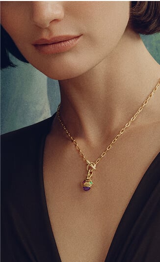 A woman wearing a David Yurman Renaissance necklace.