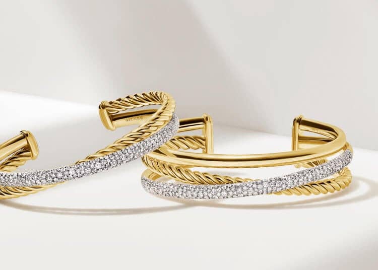 David Yurman Crossover® bracelets in gold with pave diamonds.