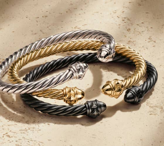 A collection of 3 David Yurman Cable Bracelets.
